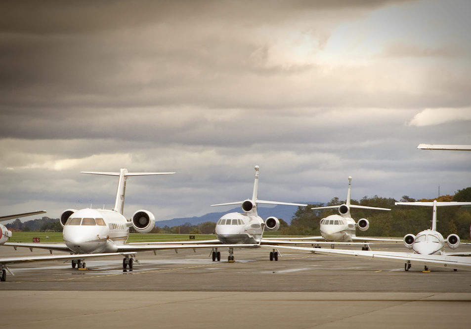 Business aircraft parked on an airport